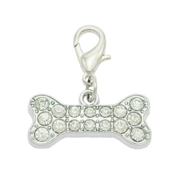 A silver-colored dog bone-shaped collar charm adorned with real czech crystals.