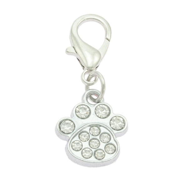 A silver-colored dog collar charm in the shape of a dog paw, adorned with real czech crystals.